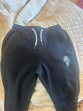 Kids Black Jogger Sweatpants with Playful Embroidered Patch